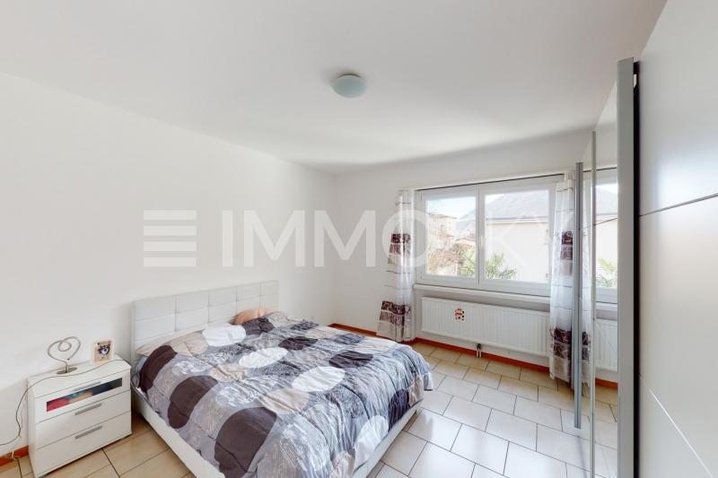 Camera da letto luminosa - 3.5 stanze Appartamento a Giubiasco