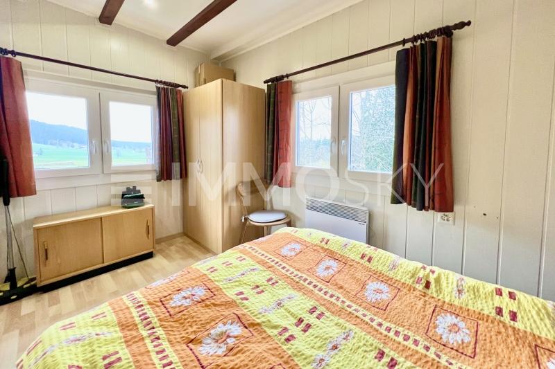 Chambre à coucher avec vue - 2.5 pièces Chalet a Le Locle