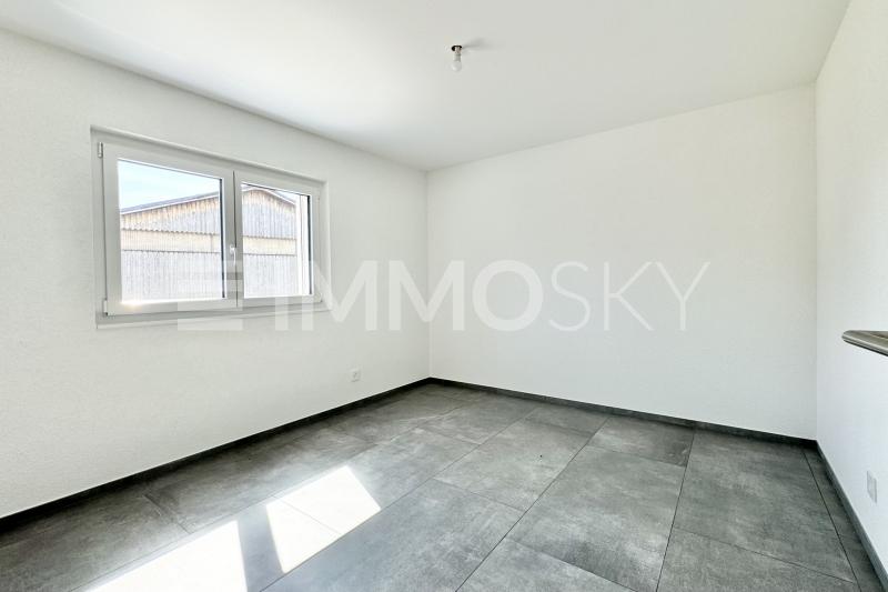 Chambre lumineuse - 3.5 pièces Appartement en rez-de-chaussée a Delémont