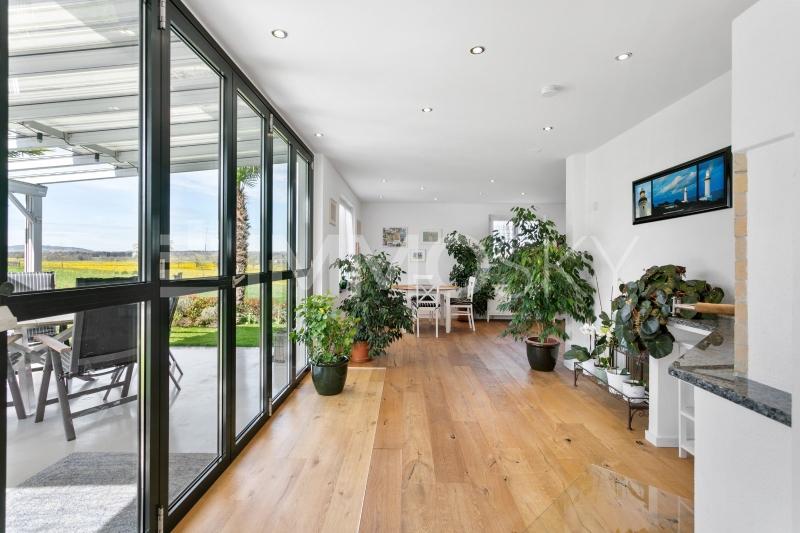Wohnbereich im EG und Terrasse - 7.5 pièces Maison individuelle a Amriswil