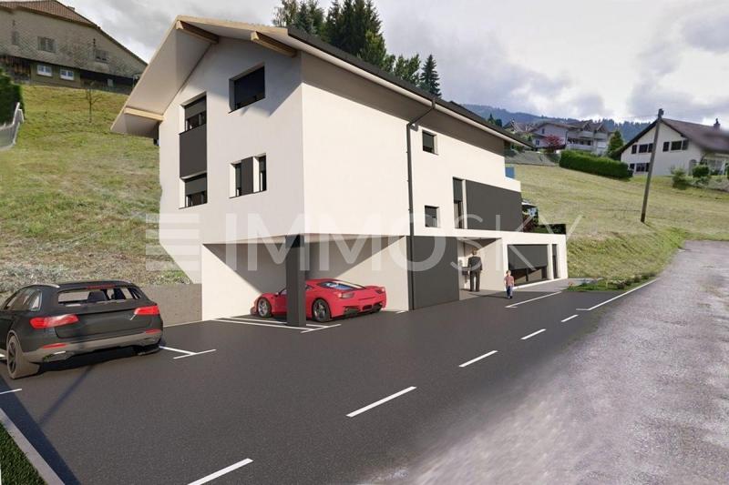 Neubau im Zentrum von Plasselb - 5.5 Zimmer Gartenwohnung in Plasselb