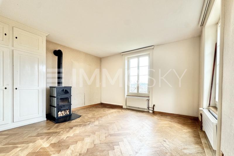 Séjour avec poêle pour une ambiance chaleureuse - 4.5 pièces Maison a Biel/Bienne