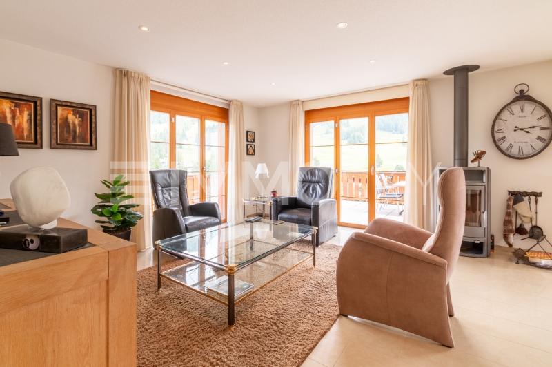 Wohnbereich mit Schwedenofen - 5.5 pièces Maison individuelle a Schwarzsee