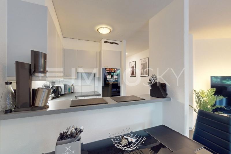 Cuisine ouverte sur le salon pour plus de convivialité - 2.5 pièces Appartement a Monthey
