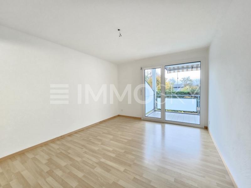 Schlafzimmer mit Zugang zur Terrasse - 4.5 pièces Appartement a Trimmis