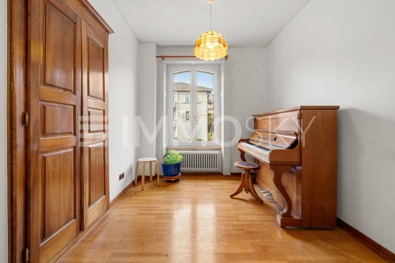 Espace piano - 13.5 pièces Maison bifamiliale a Corcelles NE