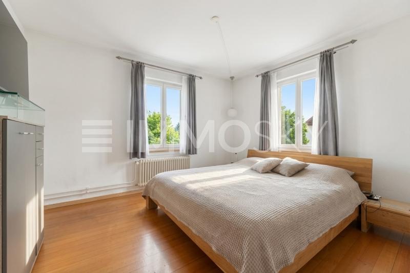 Eines der Schlafzimmer - 6 pièces Maison bifamiliale a Kreuzlingen