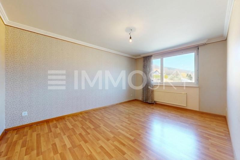 Grande chambre - 3.5 pièces Appartement a Tramelan