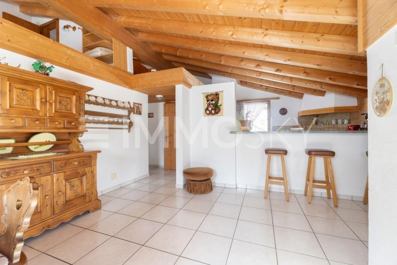 Wohnzimmer mit rustikalem und gemütlichem Ambiente - 13 pièces Immeuble d'habitation a Curaglia