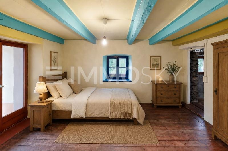 Camera da letto in stile rustico - 7 pièces Maison a Auressio