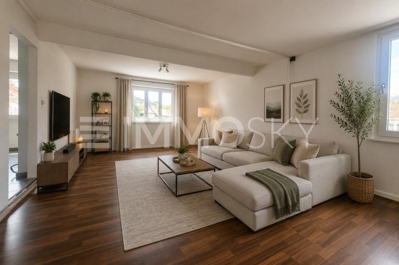 Wohnzimmer im 2. OG - 12 Zimmer Wohn- und Geschäftshaus in Reconvilier