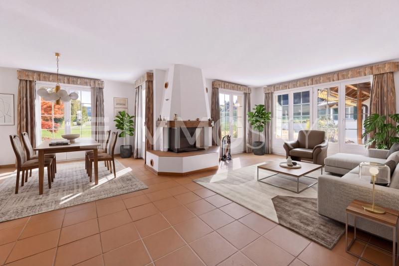 Wohnbereich mit Cheminée - 5.5 Zimmer Landhaus in Embrach