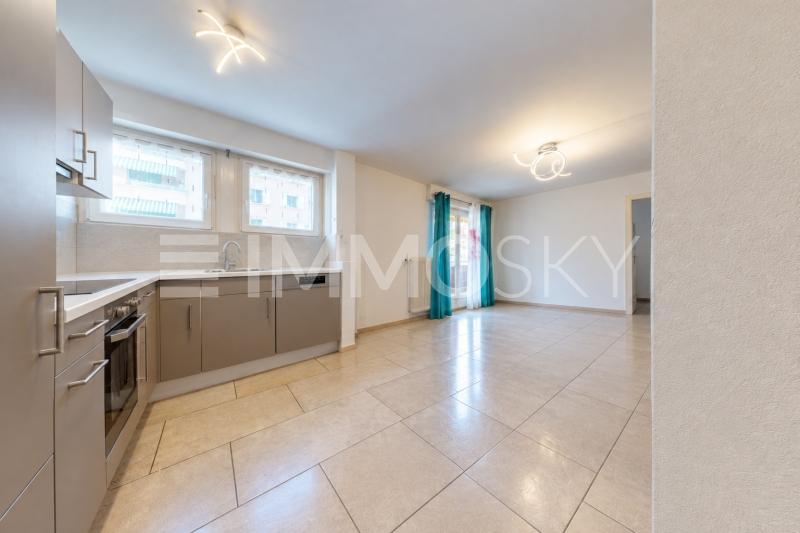 Cuisine moderne ouverte sur le séjour - 3.5 Zimmer Etagenwohnung in Bussigny Lausanne